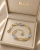 Złota-damska-Bransoletka-DallAcqua-z-Akwamarynem-pr.585-14k-1